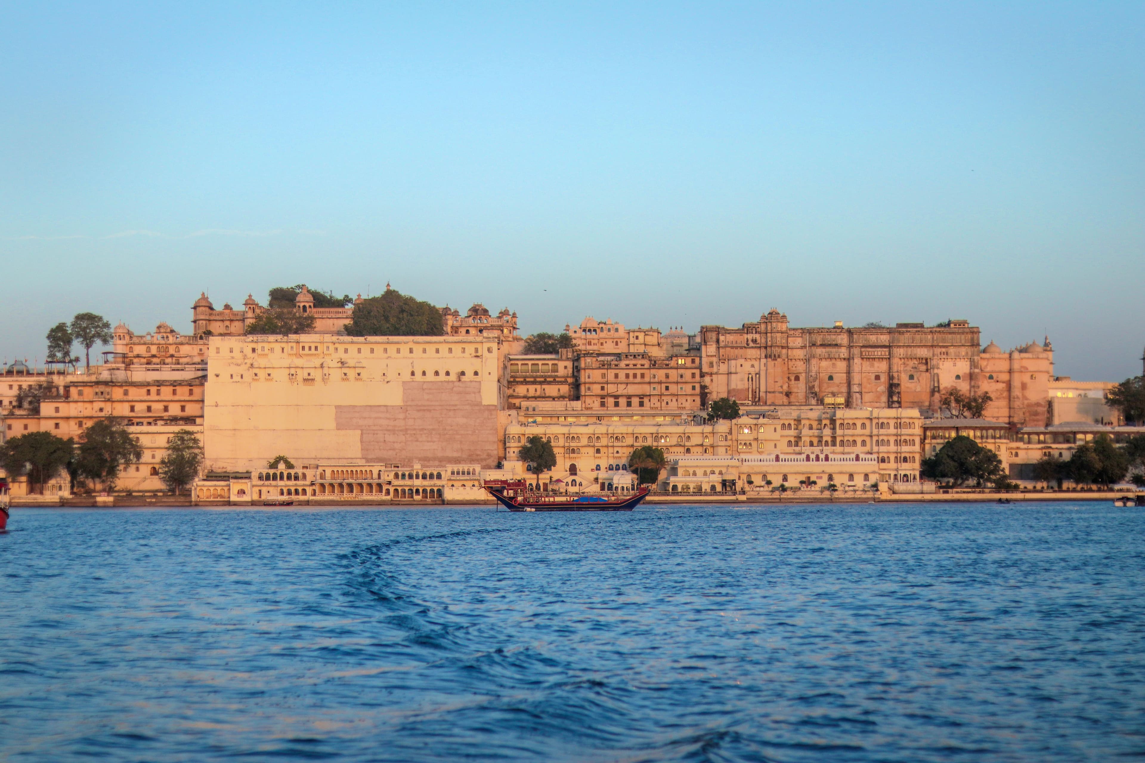 Serene lakeside palaces and lush green hills of Udaipur Rajasthan India