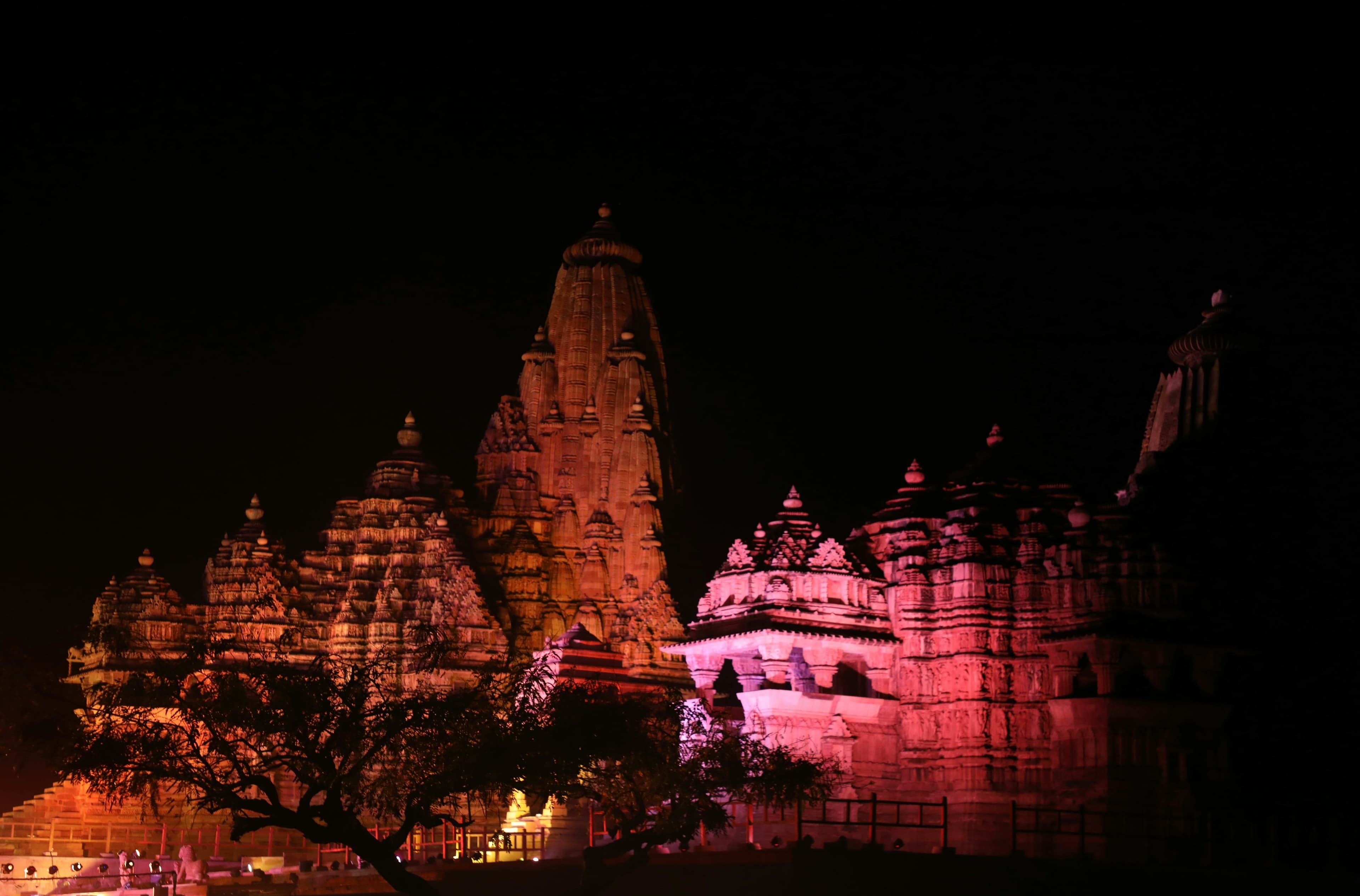 Khajuraho Western Group temples illuminated during the Sound and Light Show at night