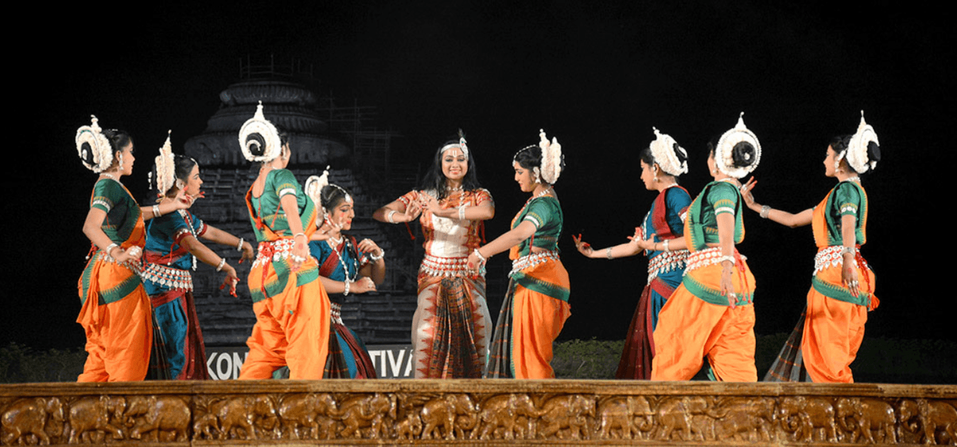 Konark Dance Festival - classical Odissi performance at Sun Temple with 24 wheels and stone chariot