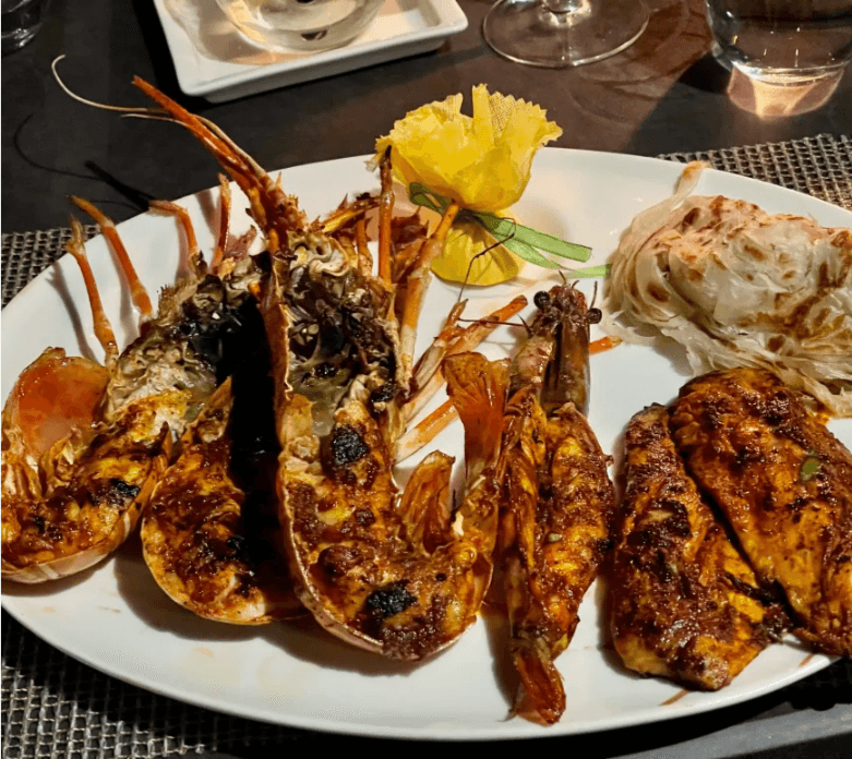 Seafood and coastal cuisine at beachside restaurants in Mahabalipuram
