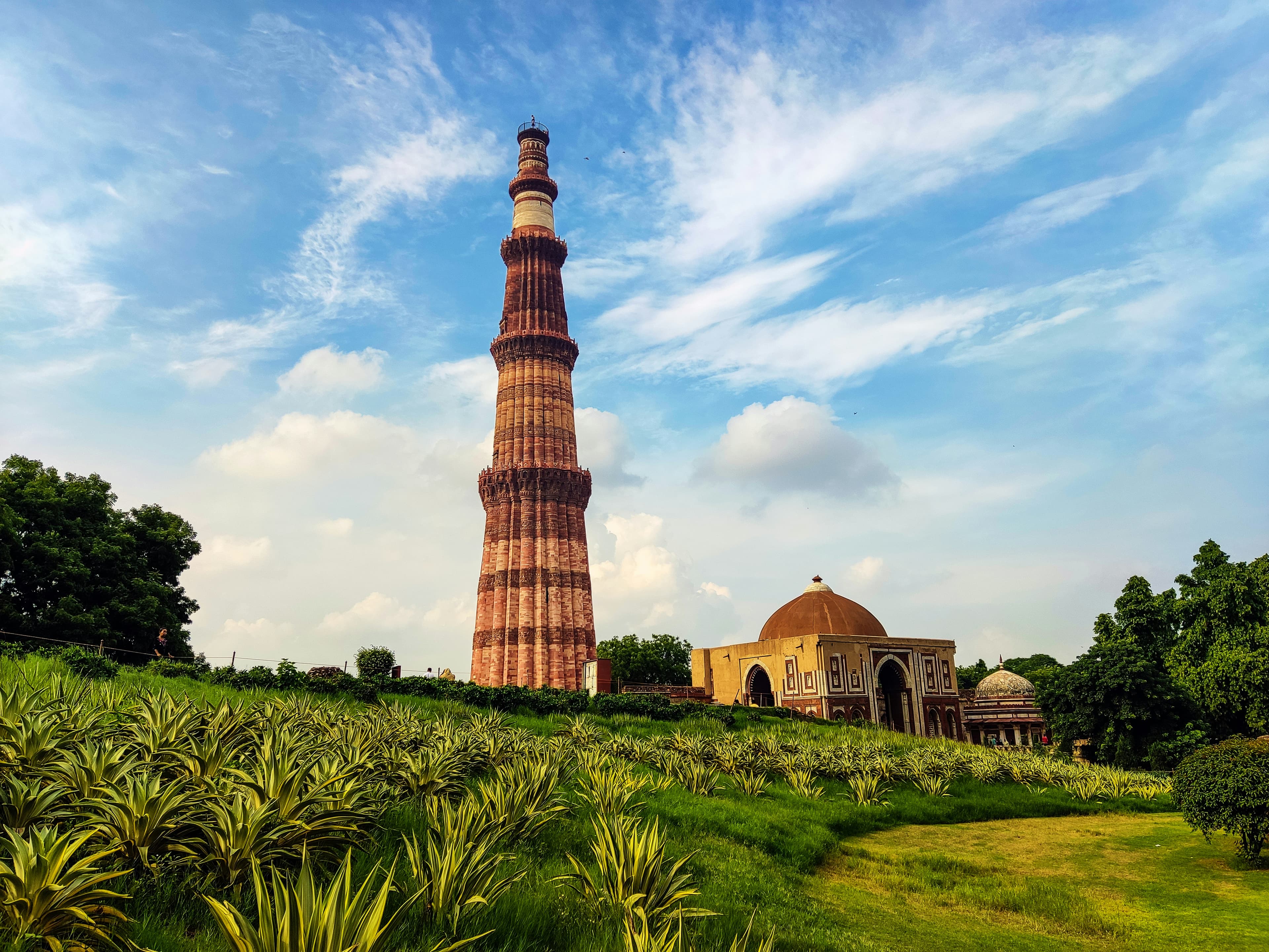 Panoramic view of the Qutub Minar complex gardens and monuments in Mehrauli South Delhi