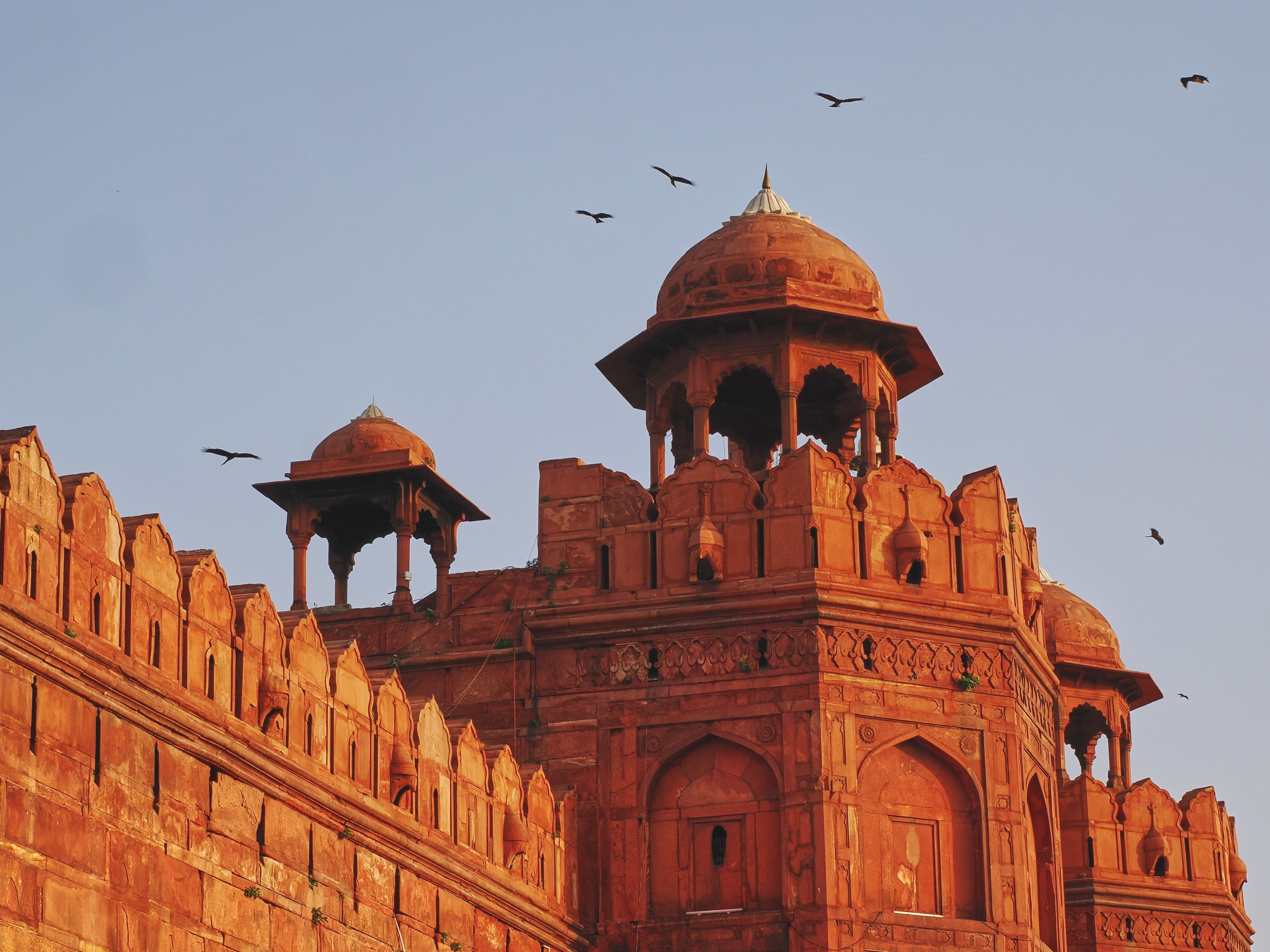 Red Fort Delhi - panoramic view of Mughal fortress with red sandstone walls and UNESCO heritage